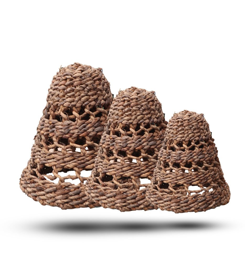 Three woven, bell-shaped baskets sit together against a white background.