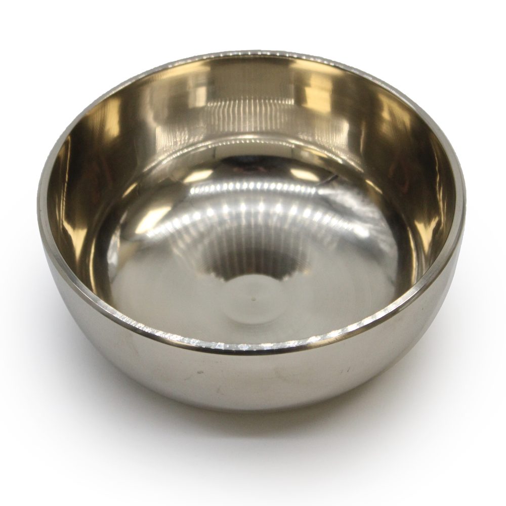 A polished stainless steel bowl is empty, reflecting light with a glossy surface, placed on a smooth white background for display.
