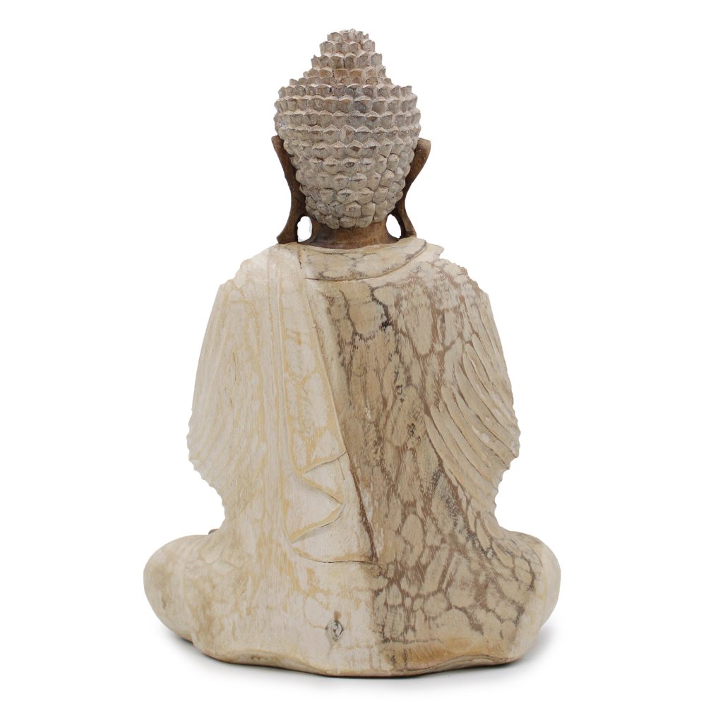 A stone Buddha statue sits cross-legged, facing away, with detailed textured hair and a robe. The surface has a marbled pattern, isolated on a white background.