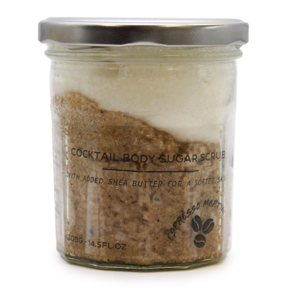A jar holds a layered "COCKTAIL BODY SUGAR SCRUB WITH ADDED SHEA BUTTER FOR A SOFTER SKIN," labeled "ESPRESSO MARTI, 300G-14.5FL OZ", in a bright, white-background setting.
