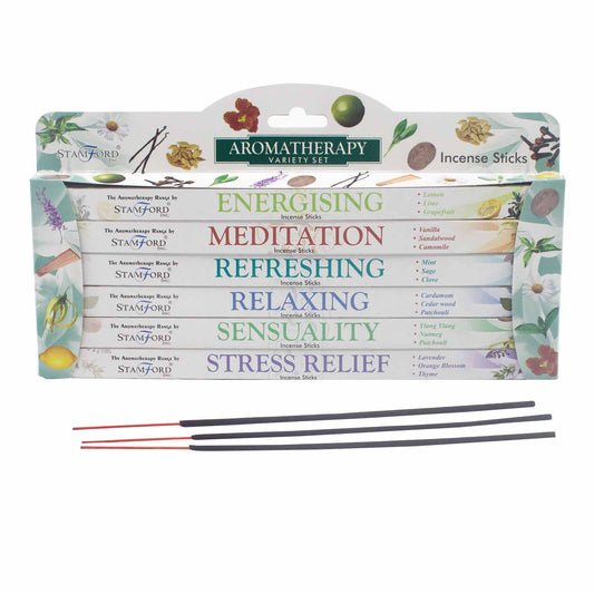 Incense stick variety set labeled "Aromatherapy" by Stamford, offering six types: Energising, Meditation, Refreshing, Relaxing, Sensuality, Stress Relief, each with descriptions like lemon, lavender, and cardamom scents. Three sticks are pictured below.