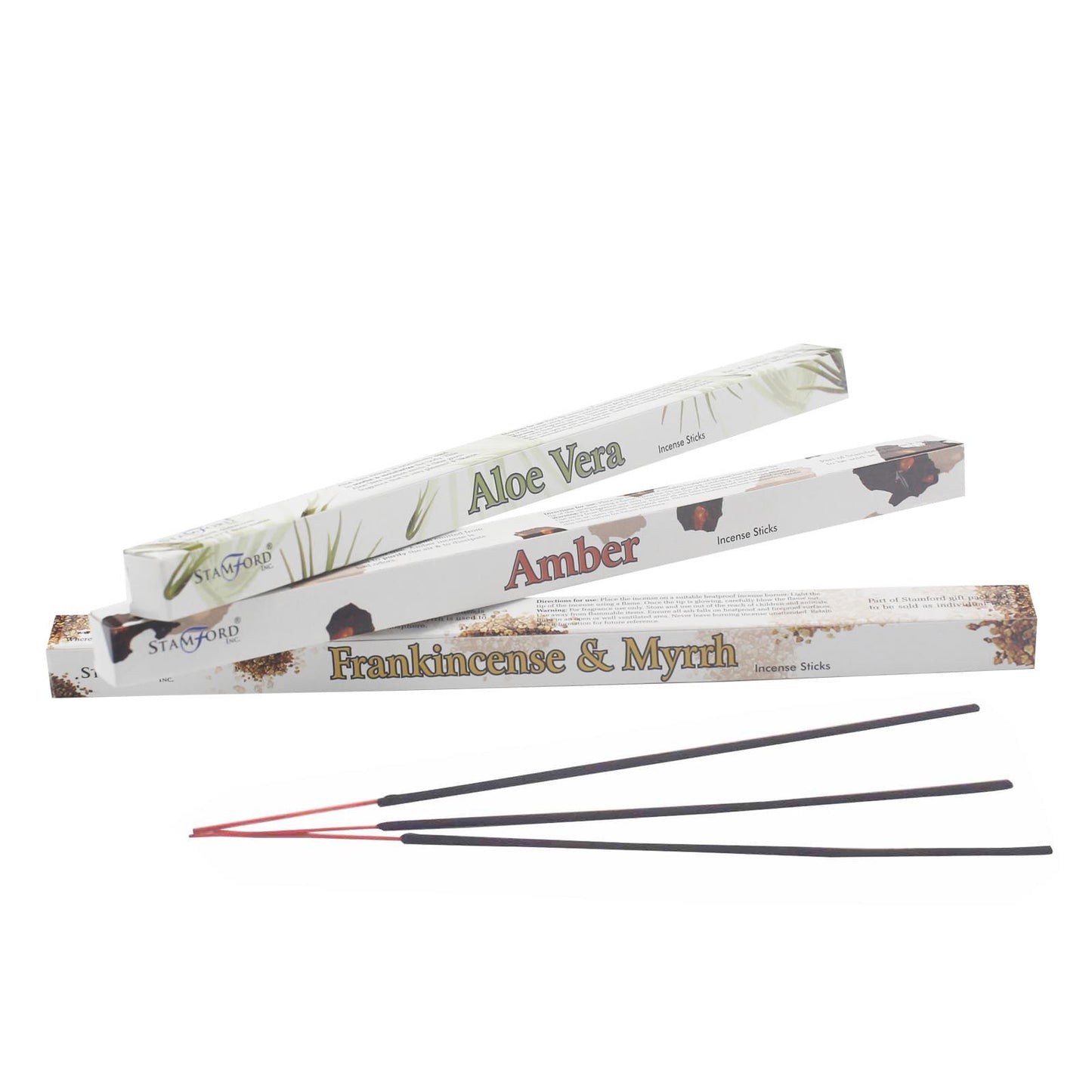 Three incense stick boxes labeled "Aloe Vera," "Amber," and "Frankincense & Myrrh" are stacked diagonally. Three incense sticks with red tips are positioned in front of the boxes.