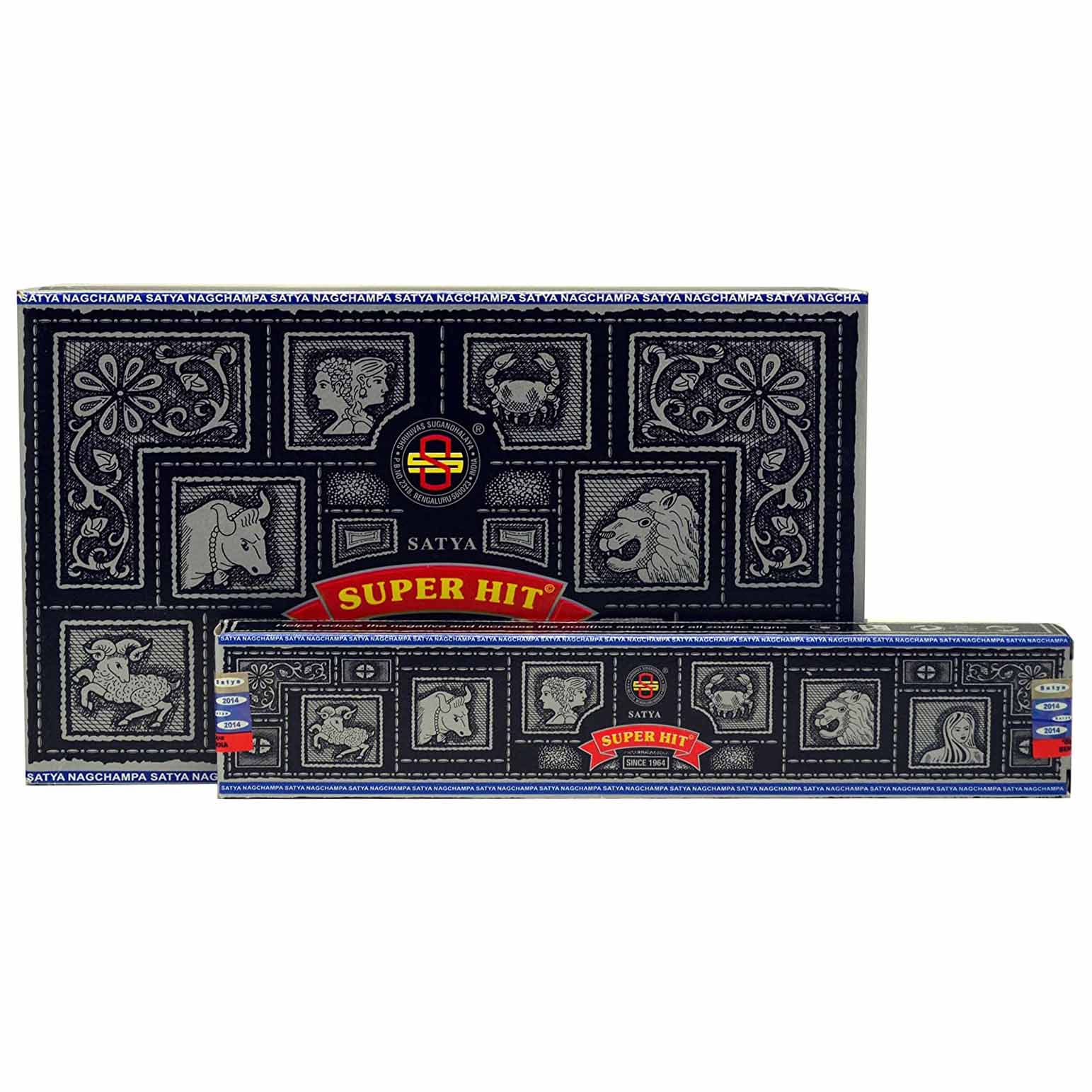 Incense box labeled "Super Hit," displaying zodiac symbols and decorative patterns, set in a dark, intricate design. Text includes "SATYA" and "SINCE 1964" with "SATYA NAGCHAMPA" repeated along the top edge.