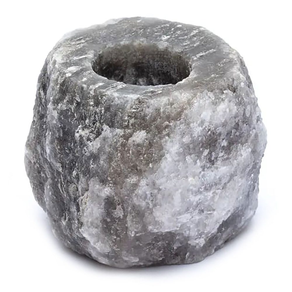 A rough, cylindrical gray stone with a hollow center, placed against a white background, suggesting a natural or rustic design element.