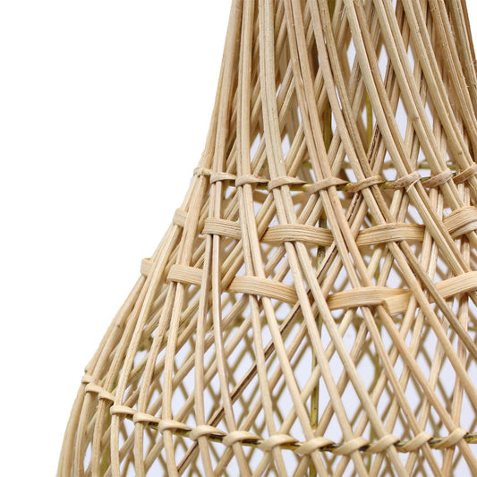 A woven rattan lampshade, exhibiting a bell shape, is intricately constructed against a white background.