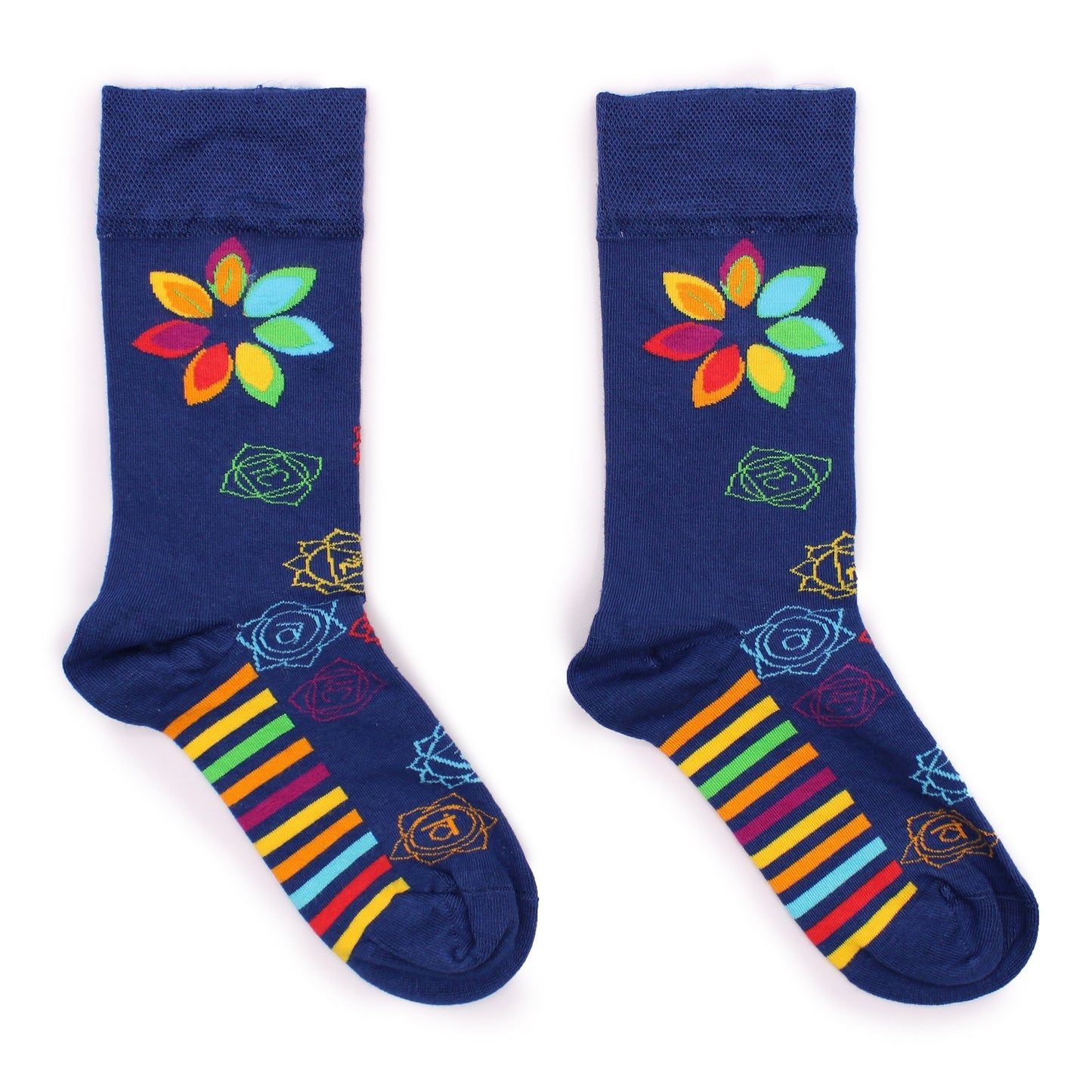 A pair of navy blue socks, displaying colorful flowers and stripes, lies on a white background.