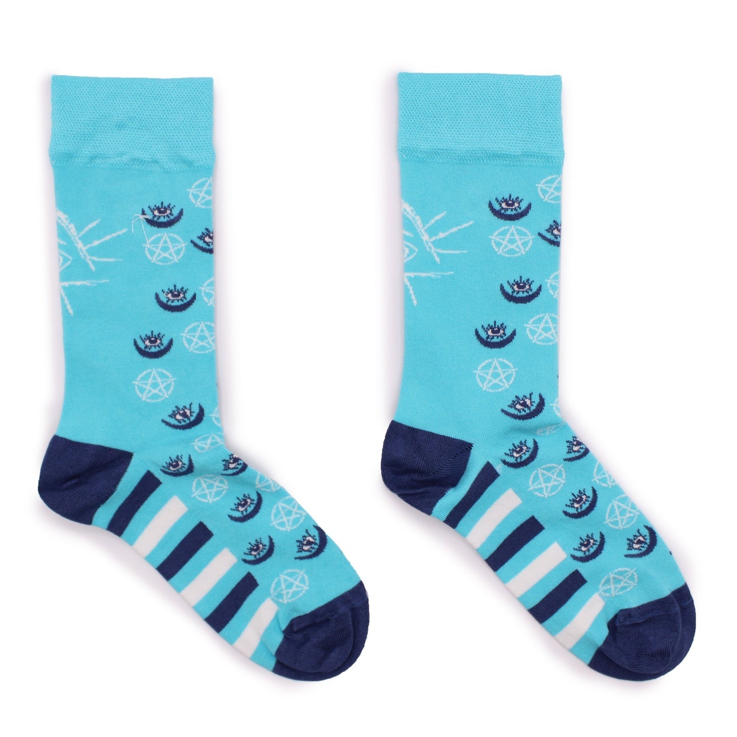 A pair of light blue socks, featuring a repeating pattern of eyes and pentagrams, lies on a white background.