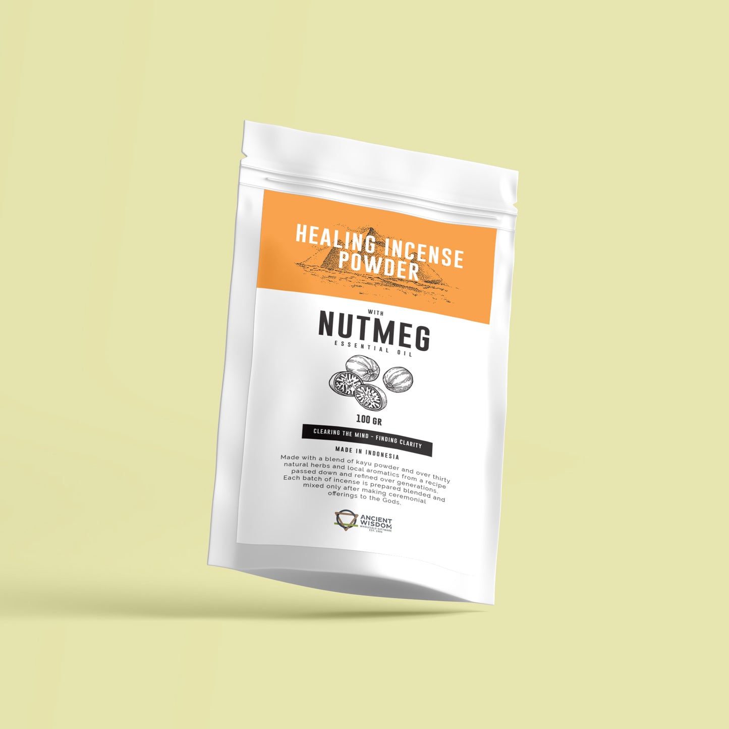 A white package labeled "HEALING INCENSE POWDER" with nutmeg essential oil is prominently displayed. It contains 100 grams and claims to clear the mind and provide clarity. The packaging describes being made with a blend of natural herbs and ingredients from Indonesia. The backdrop is a light, pastel-colored surface.