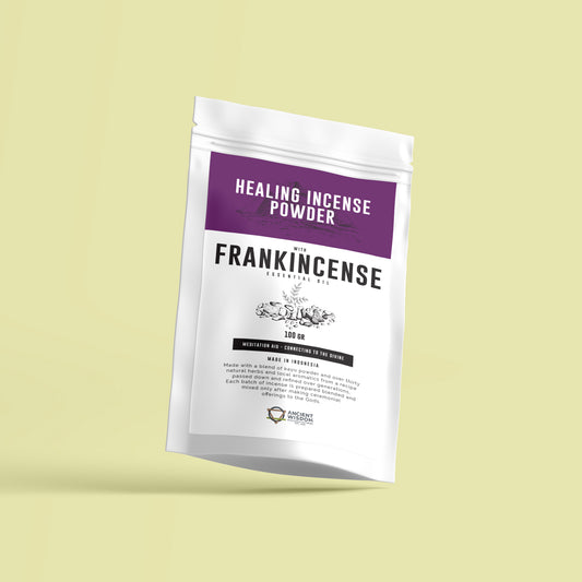 A white pouch labeled "Healing Incense Powder with Frankincense Essential Oil, 100gr." It's used for meditation and divine connection. Made in Indonesia with over thirty natural herbs. The background is light yellow.