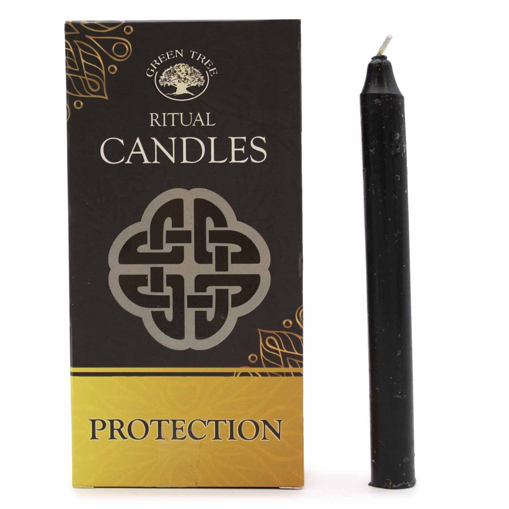 A black candle is shown beside a black and gold box labeled "GREEN TREE RITUAL CANDLES", with a Celtic knot design. "PROTECTION" is printed on the gold portion of the box, which is on a white surface.