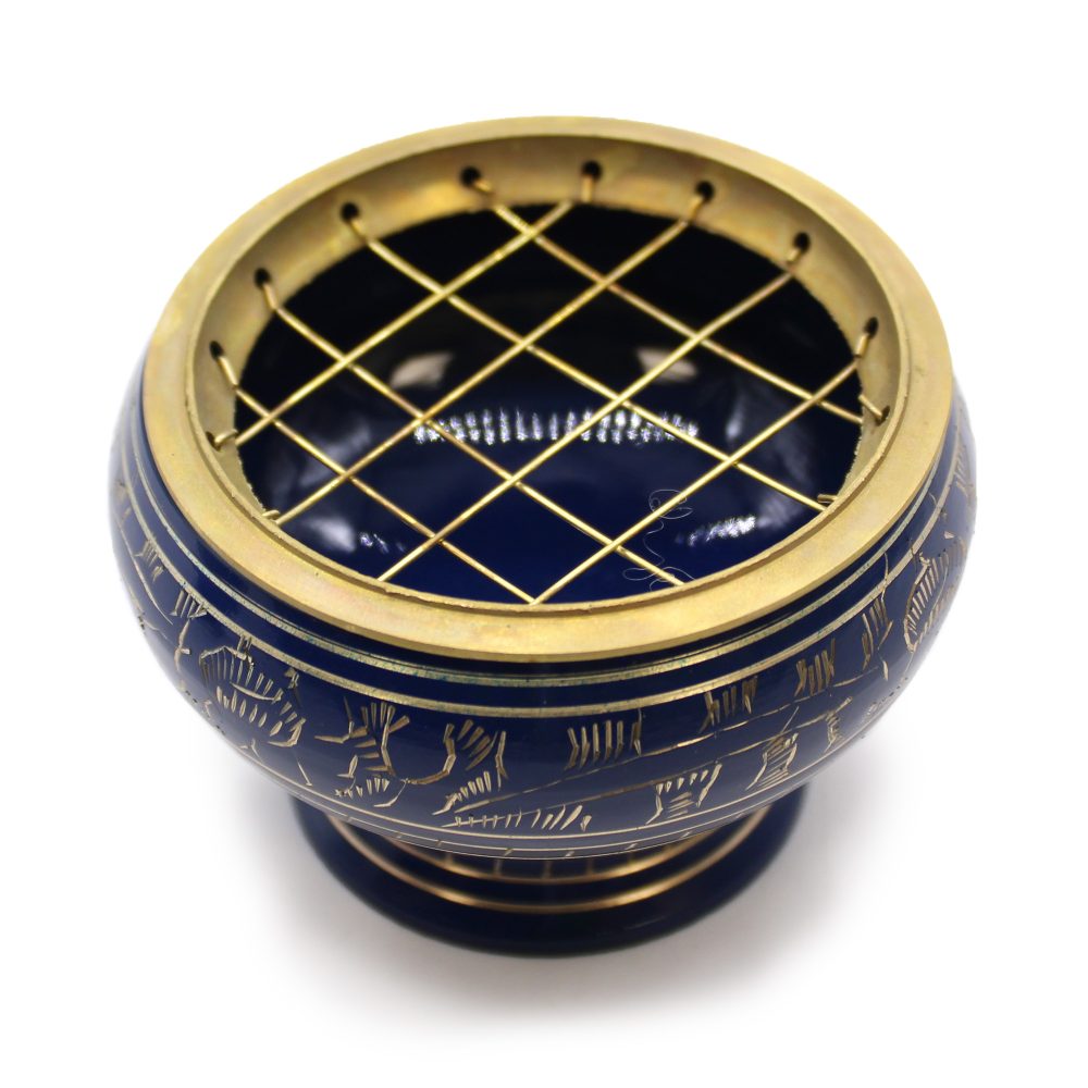 A deep, ornate blue bowl with gold Egyptian hieroglyphs is topped by a crisscross golden grid, resting on a white background.