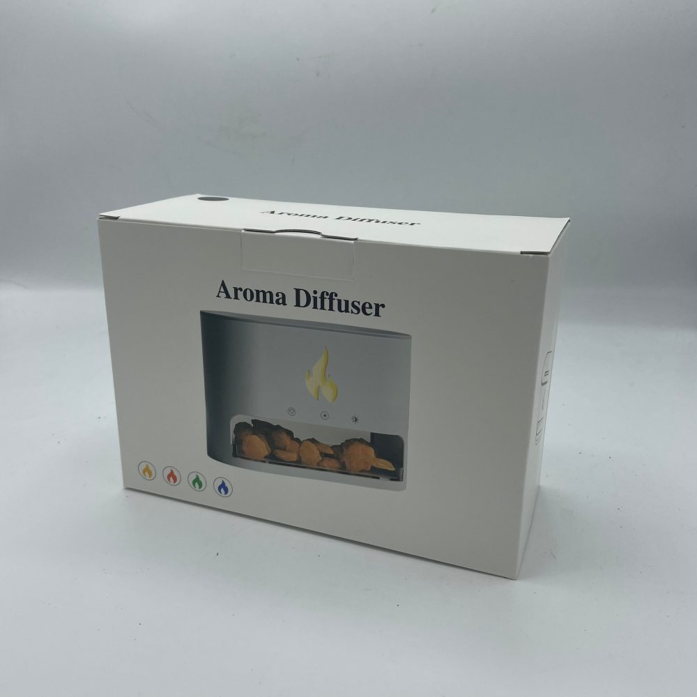 Box with "Aroma Diffuser" printed on top shows an image of a diffuser resembling a fireplace. The box sits on a white surface.