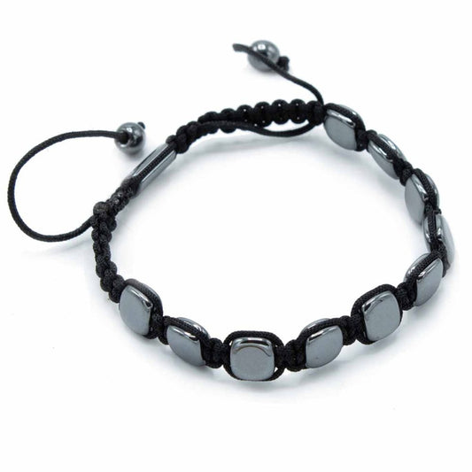 A bracelet is featured, constructed of square, metallic gray stones woven together with black cord. The bracelet is adjustable, displayed against a white background.