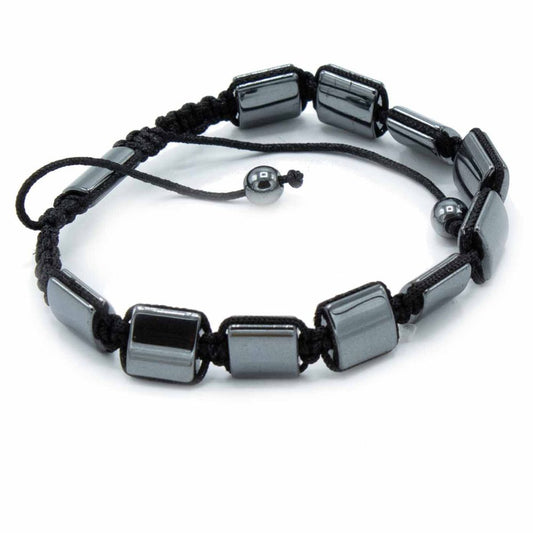 A bracelet features rectangular, shiny dark-gray stones connected by woven black string. The bracelet is open-ended, featuring a single, round stone on one end of the drawstring. The background is white.