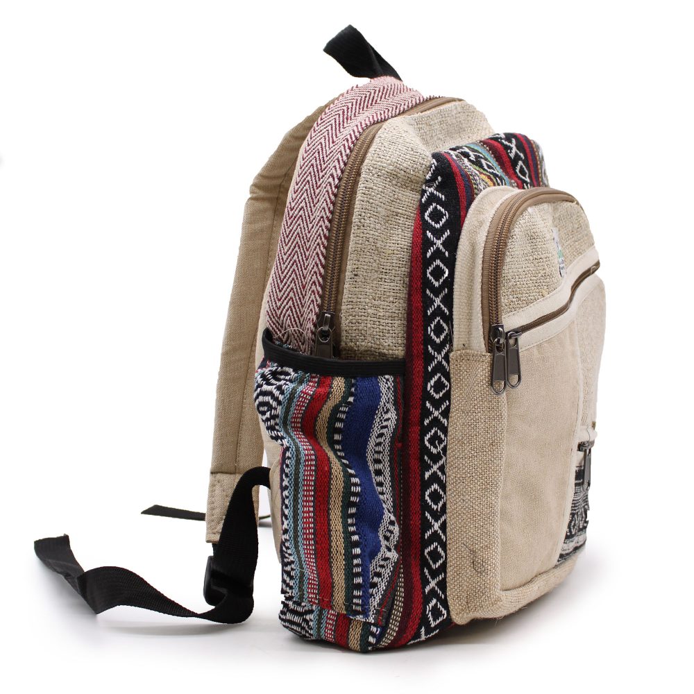 A beige woven backpack sits on a white surface. It features striped patterns, zippers, and adjustable black straps.