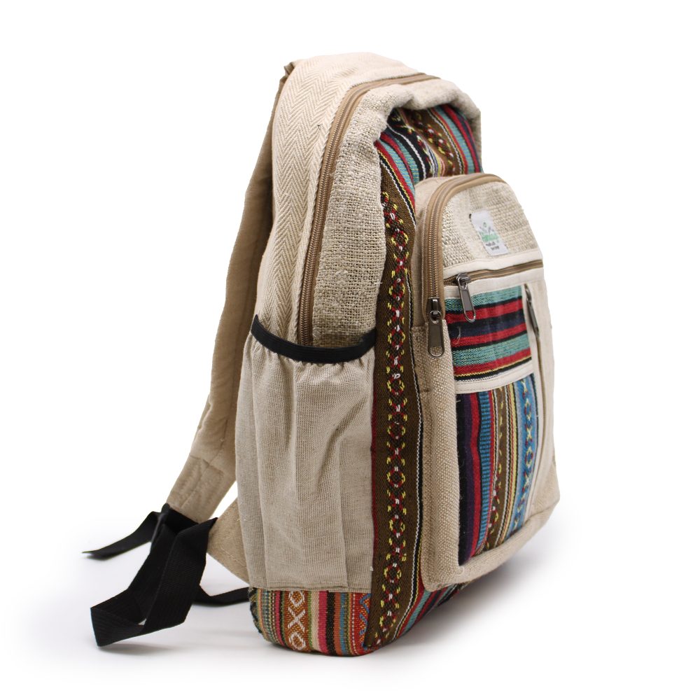 A beige hemp backpack with colorful striped trim sits against a white background. Zippers are visible on the pockets, and black straps hang down.