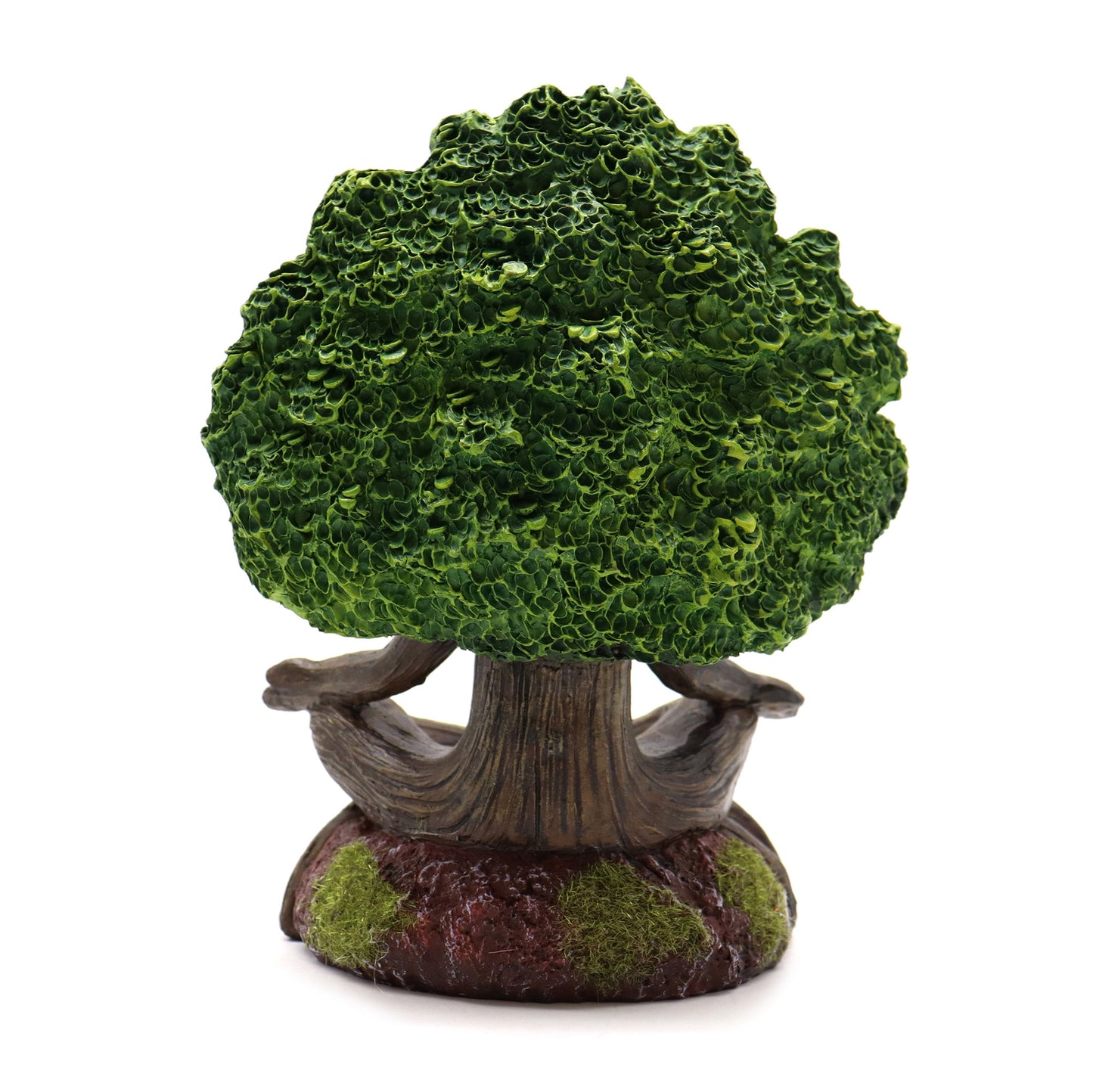 A small tree sculpture sits cross-legged, resembling a meditating figure with a lush, green canopy, on a mossy mound.