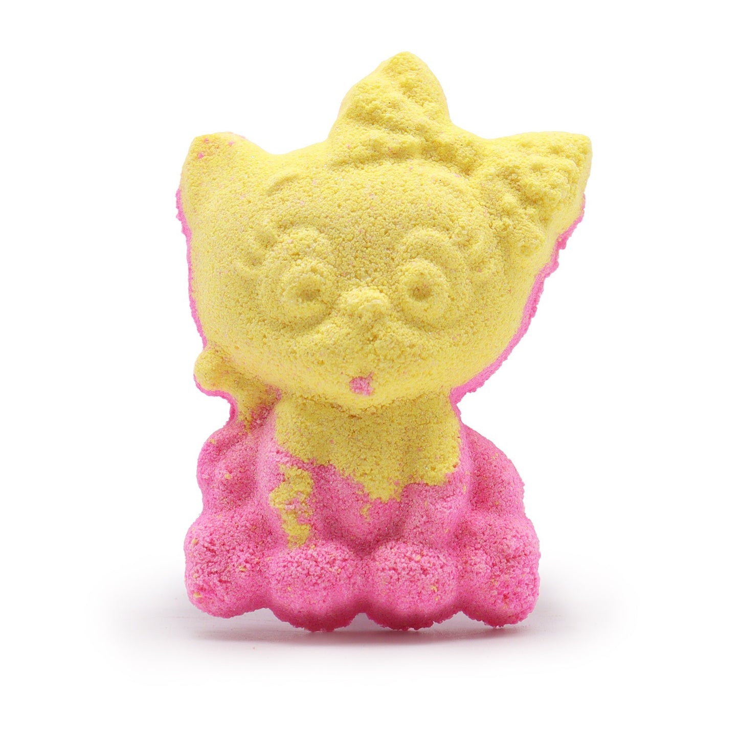 A cat-shaped bath bomb is sitting upright, featuring a yellow top and pink bottom, with textured details, against a plain white background.