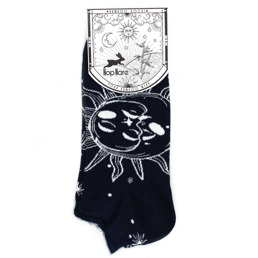 A pair of dark blue socks, featuring a sun and moon design, is displayed against a white background. The socks are packaged with a tag that reads "*BAMBOO SOCKS*", "Hop Hare", and "YOUR BAMBOO WEAR".