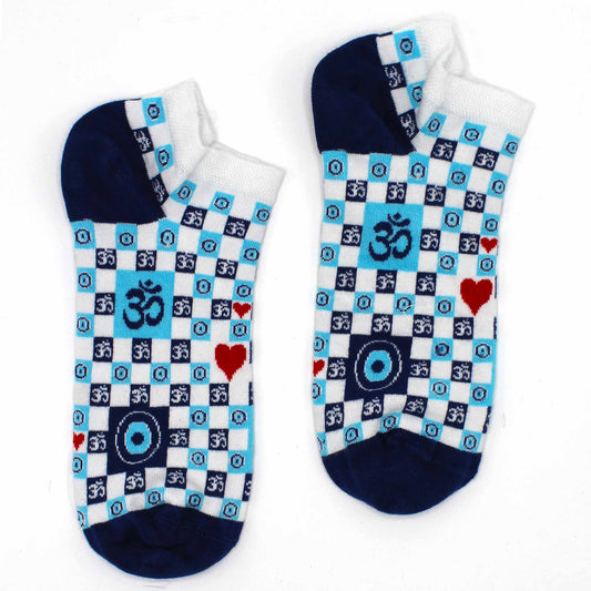 Two ankle socks lie on a white background. They are decorated with a pattern of blue and white checks, Om symbols, and red hearts.
