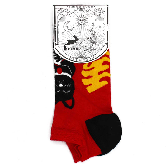 Red ankle socks, featuring black and yellow designs, displayed against a white background on a card that reads "*BAMBOO SOCKS* Hop Hare YOUR BAMBOO WEAR".