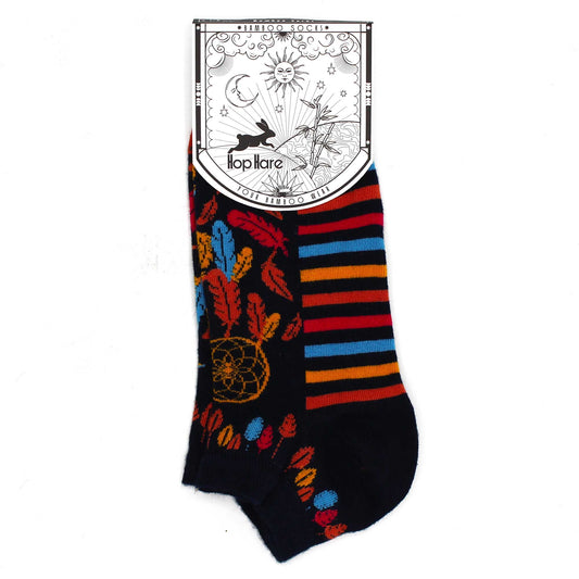 A pair of dark-navy ankle socks, displaying colorful patterns of feathers and stripes, is presented on a white background, attached to a card reading "*BAMBOO SOCKS* Hop Hare YOUR BAMBOO WEAR".
