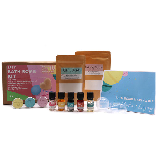 DIY Bath Bomb Kit, containing citric acid and baking soda packets, essential oils, dyes, bath bomb molds, and instruction cards. Includes: Himalayan salt, shapes, two scents, three dyes.