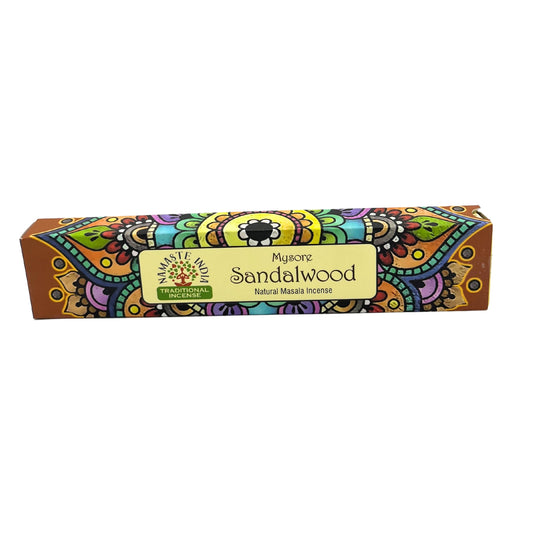 Incense package labeled "Mysore Sandalwood Natural Masala Incense," featuring vibrant, colorful patterns with floral motifs. It includes the logo "Namaste India Traditional Incense" on the decorative box.