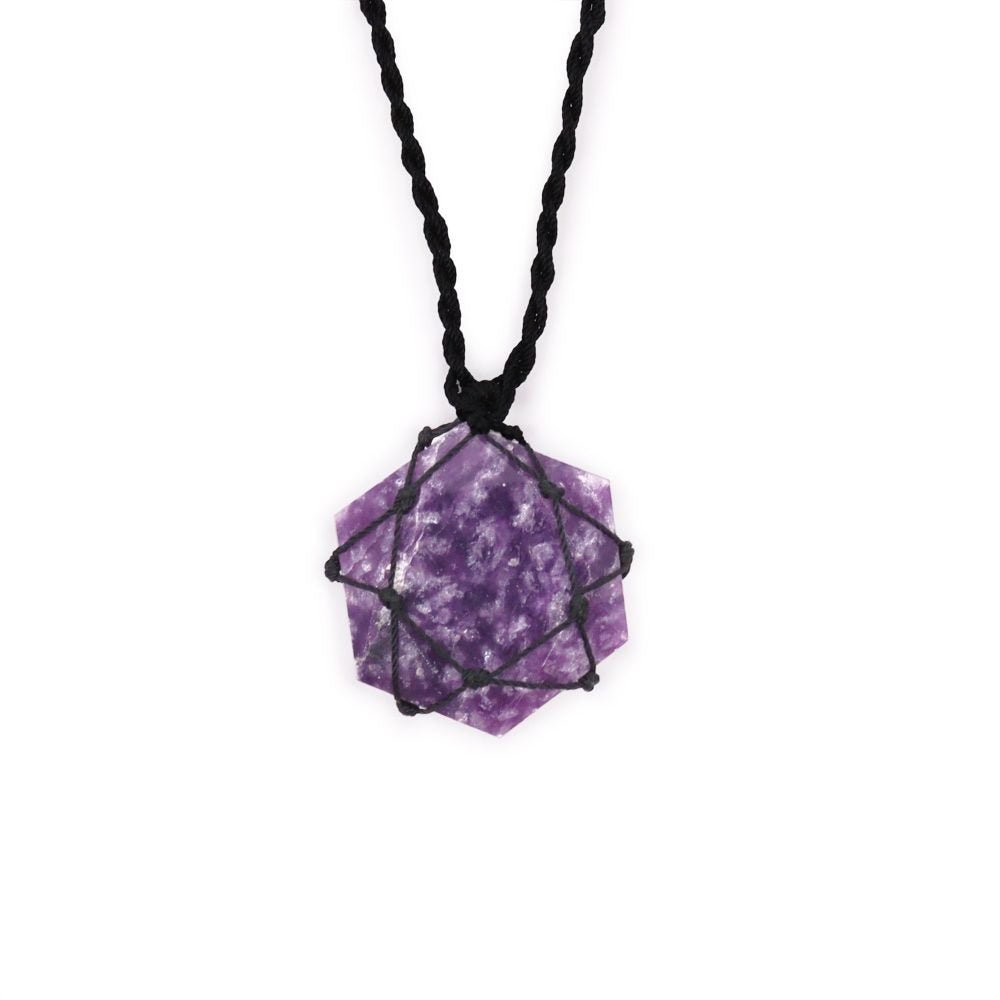 A purple stone pendant dangles from a black, woven necklace, suspended against a bright white background. The stone has a geometric shape, and is wrapped with more black, woven cording.