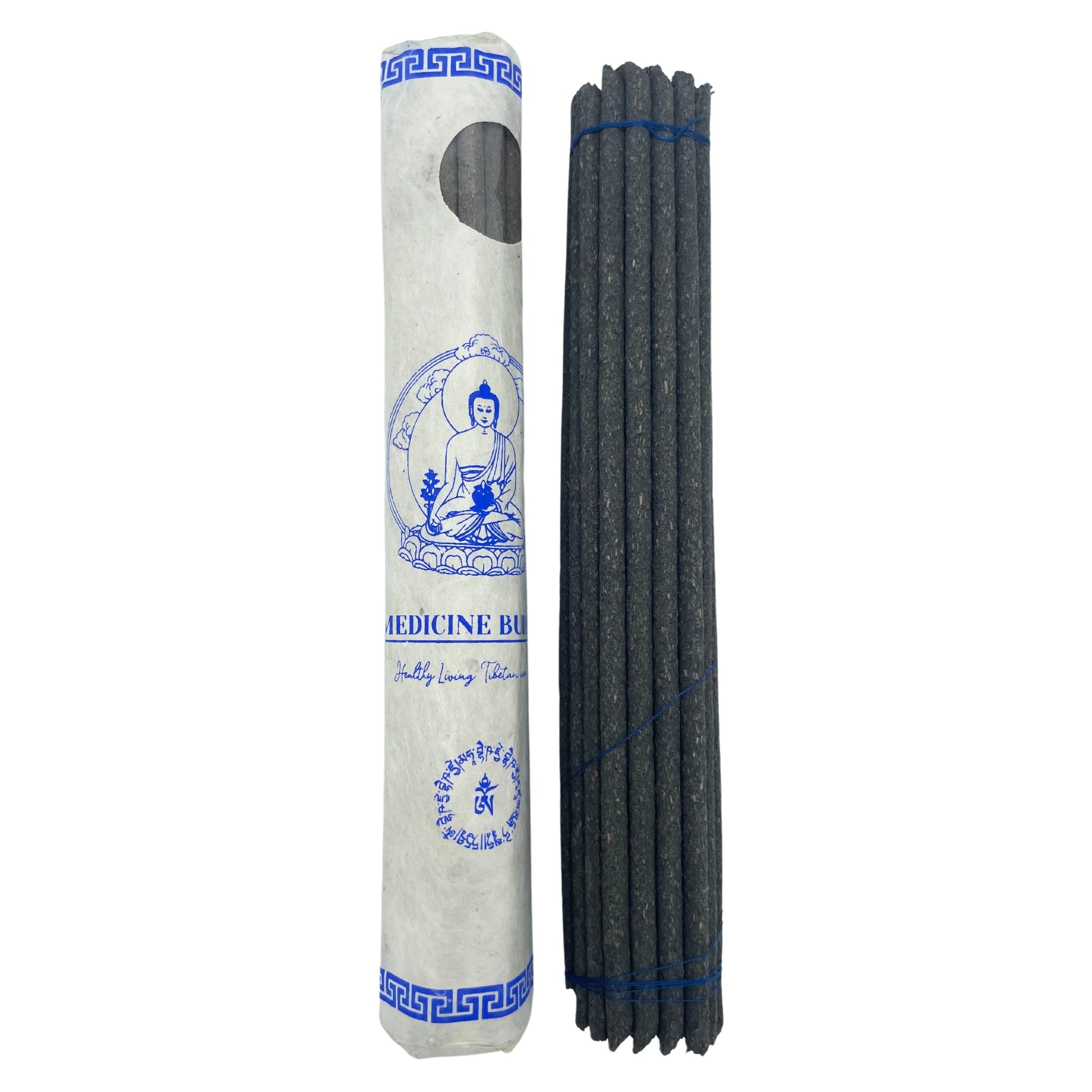 Package of incense sticks next to a cylindrical paper container with a blue Buddha illustration and text: "Medicine Buddha," "Healthy Living," and script in another language.