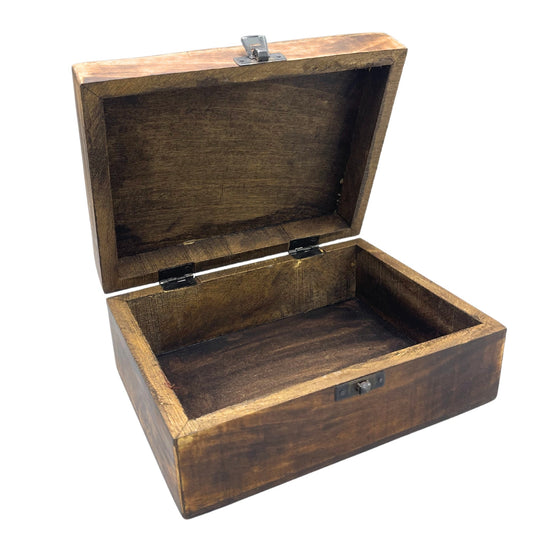 Wooden box with an open lid, displaying a dark, rustic finish. It is empty and features metal hinges and a latch, placed against a plain white background.