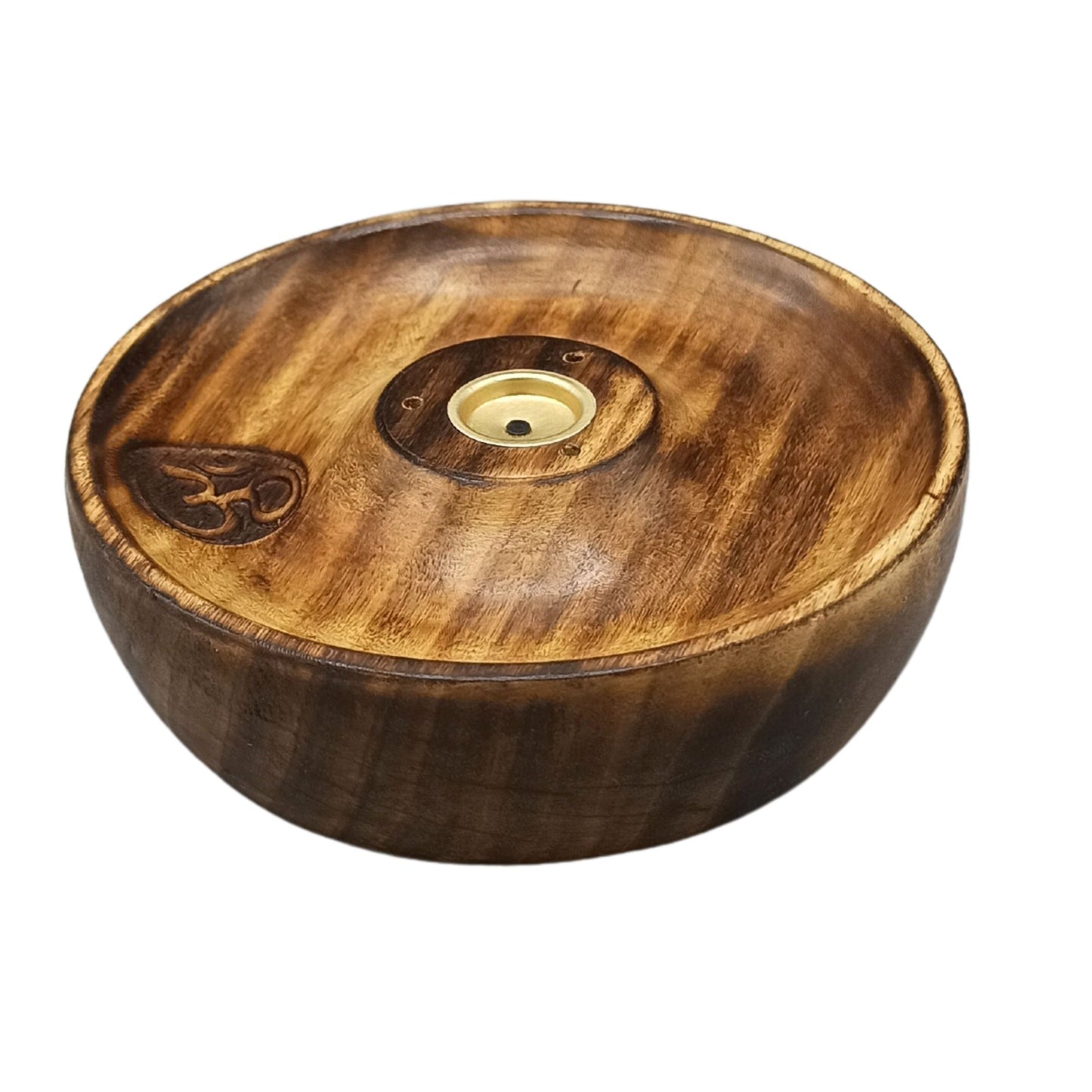 A wooden bowl-shaped incense holder featuring a central brass burner, with an engraved symbol resembling "Om" on the side, set against a plain white background.