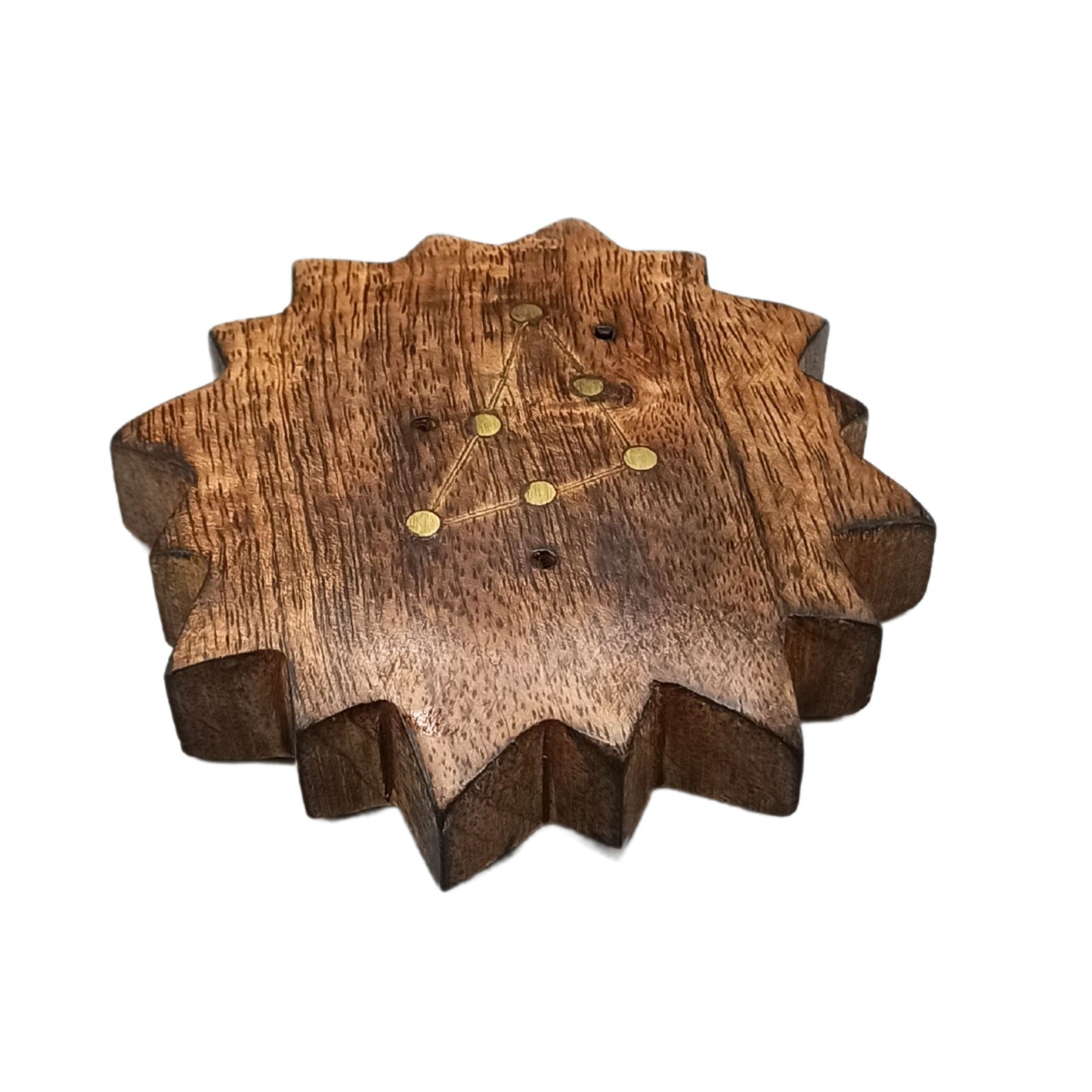 Wooden stand with star-shaped edges engraved with a constellation design featuring six gold circles connected by lines, resting on a white background.
