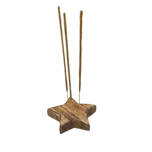 Wooden star-shaped incense holder with three burning incense sticks upright, set against a white background.