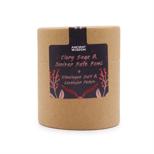 Cardboard container labeled "Ancient Wisdom Clary Sage & Juniper Bath Bomb + Himalayan Salt & Lavender Petals," featuring floral illustrations, placed against a plain white background.