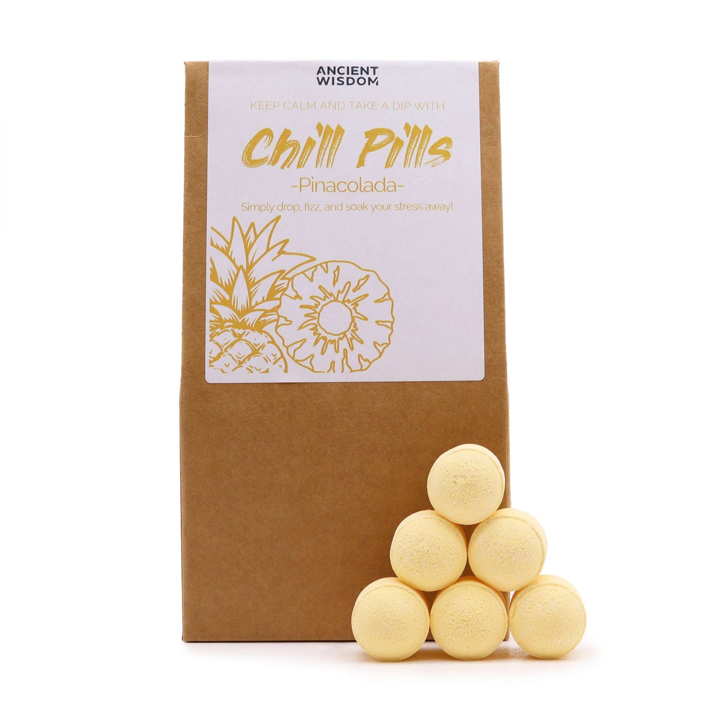 A brown package labeled "Chill Pills - Pinacolada" by Ancient Wisdom, depicting pineapple illustrations, with six stacked yellow bath fizzers beside it. Text advises: "Simply drop, fizz, and soak your stress away!"