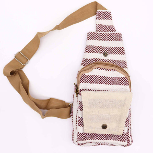 A cross-body bag is displayed on a white background. The bag is made of a striped burgundy and white patterned material with a beige strap.