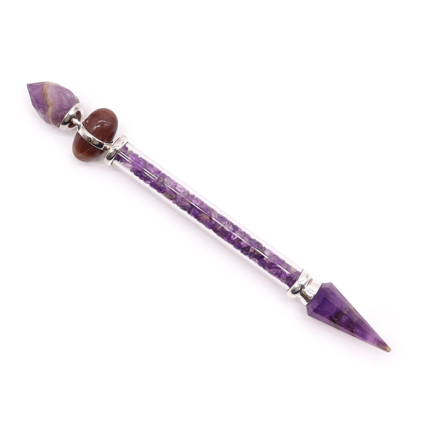 A purple crystal wand lays diagonally against a white background. The wand's core is a clear tube filled with purple stone fragments. Both ends of the tube have a larger crystal point.