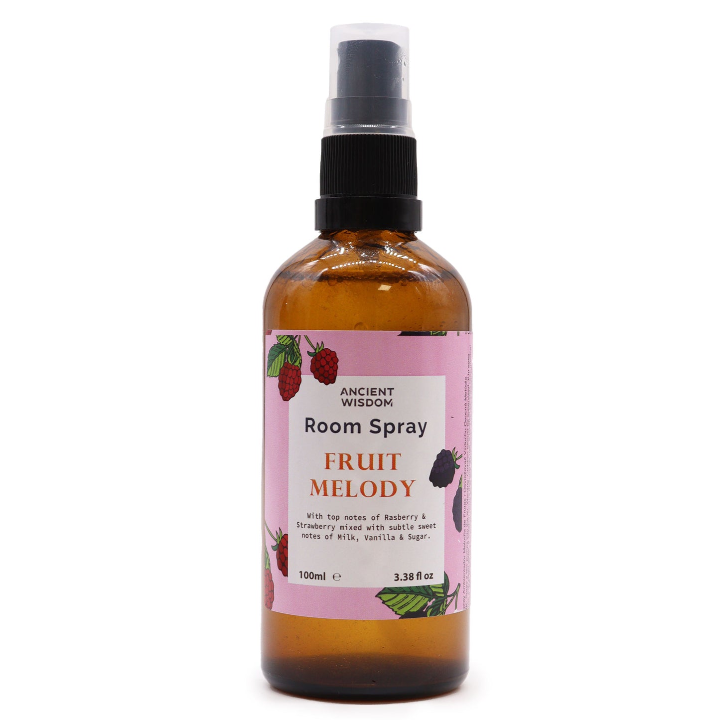 A brown glass bottle of Ancient Wisdom Fruit Melody room spray sits on a white background. It has a black spray top and a pink label with illustrations of raspberries and blackberries. The label also states "With top notes of Raspberry & Strawberry mixed with subtle sweet notes of Milk, Vanilla & Sugar. 100ml e 3.38 fl oz".