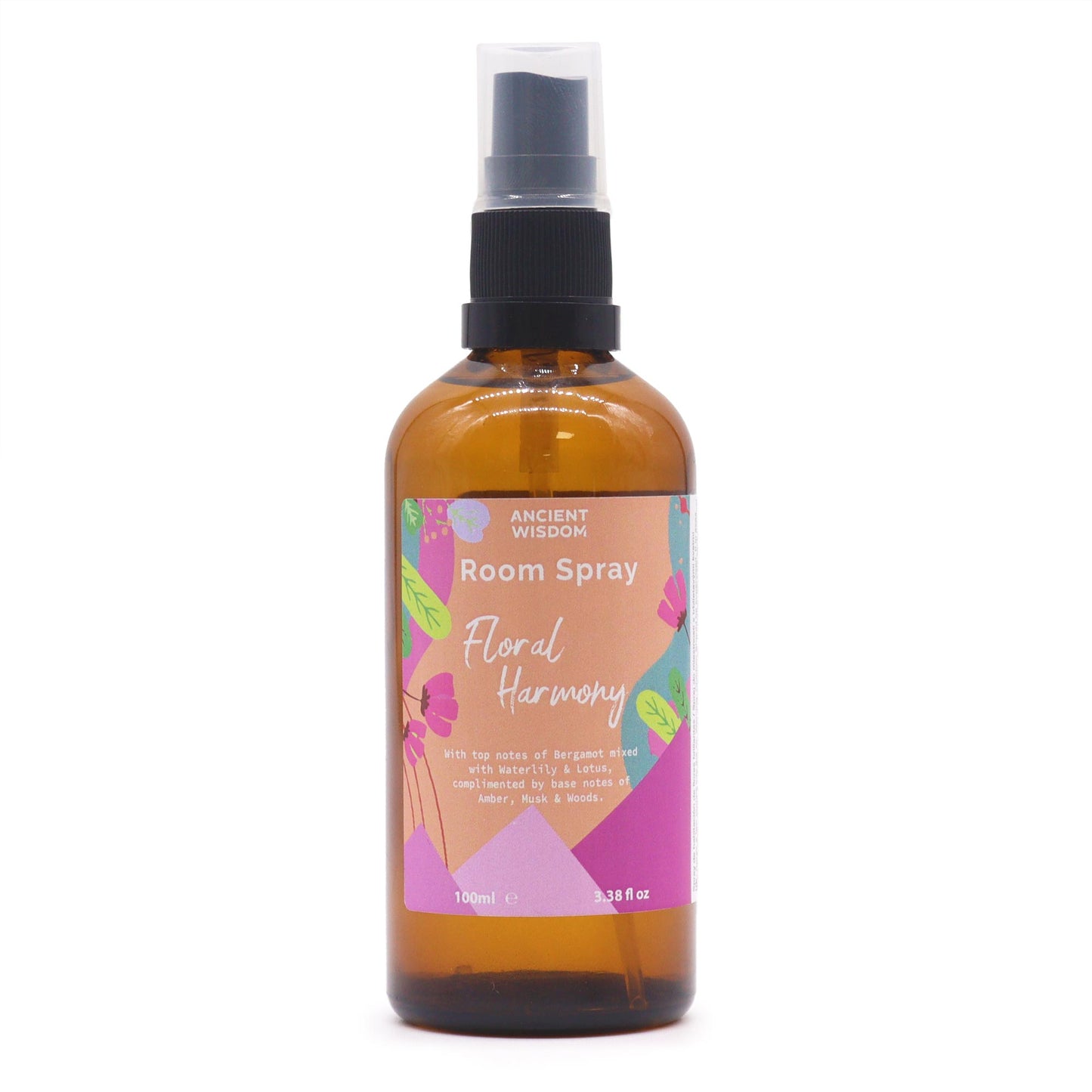 A brown glass bottle, containing room spray, sits on a white background. The spray bottle is labeled "Room Spray Floral Harmony," detailing its scent notes.