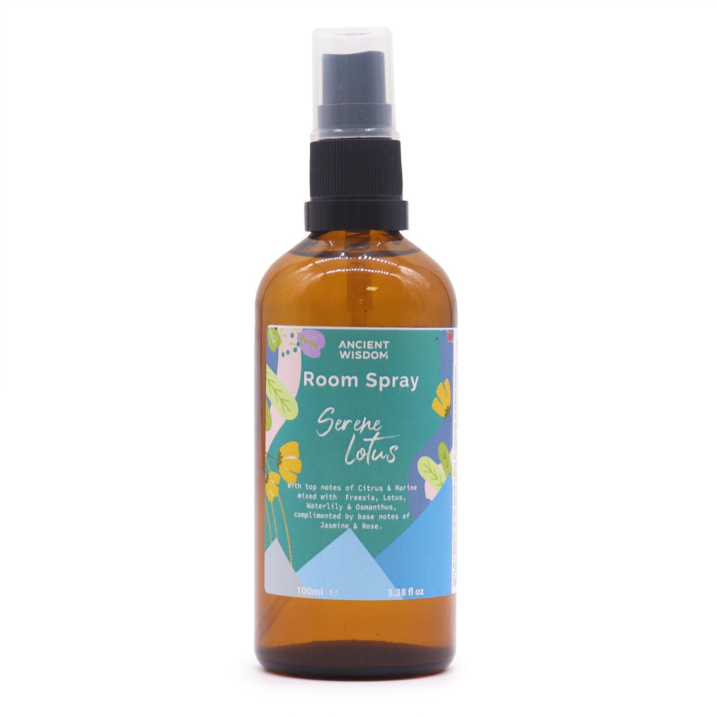 A brown glass bottle, containing room spray, sits against a white background. The bottle features a black spray nozzle and a label reading "ANCIENT WISDOM Room Spray Serene Lotus," describing its scent profile: "With top notes of Citrus & Marine mixed with Freesia, Lotus, Waterlily & Osmanthus, complimented by base notes of Jasmine & Rose. 100ml e 3.38 fl oz"