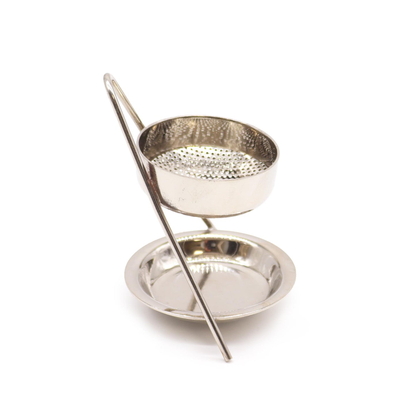 A metallic incense burner, with a perforated cup sitting atop a small dish, stands on a single, thin, vertical rod against a white background.