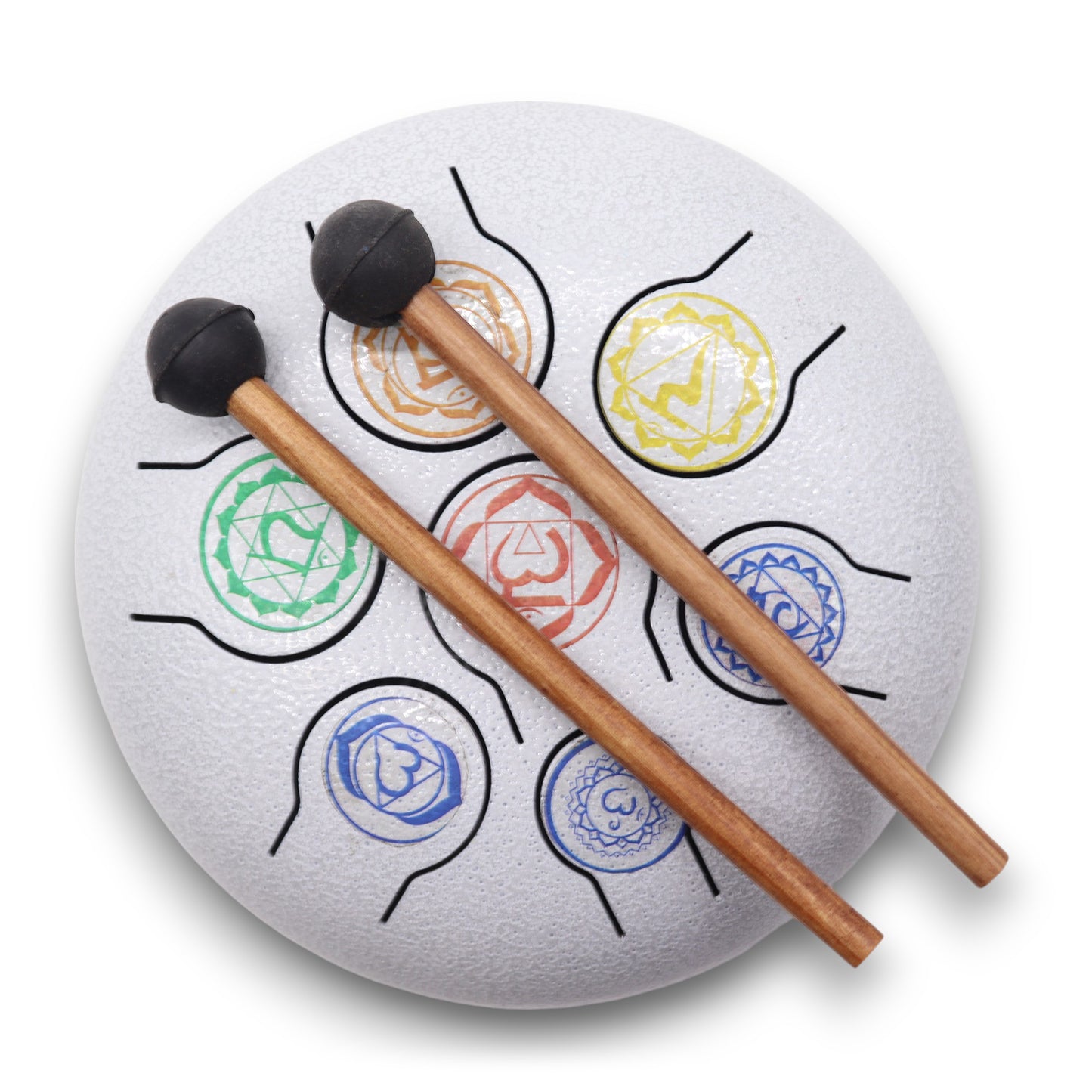 A white steel tongue drum features colorful chakra designs on its surface, with two wooden mallets resting on top. The background is plain, highlighting the drum's intricate patterns and symbols.