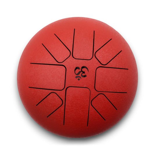 A red, circular percussion instrument with black percussion tongues and a central symbol resembling a stylized "C3" is set against a plain white background.