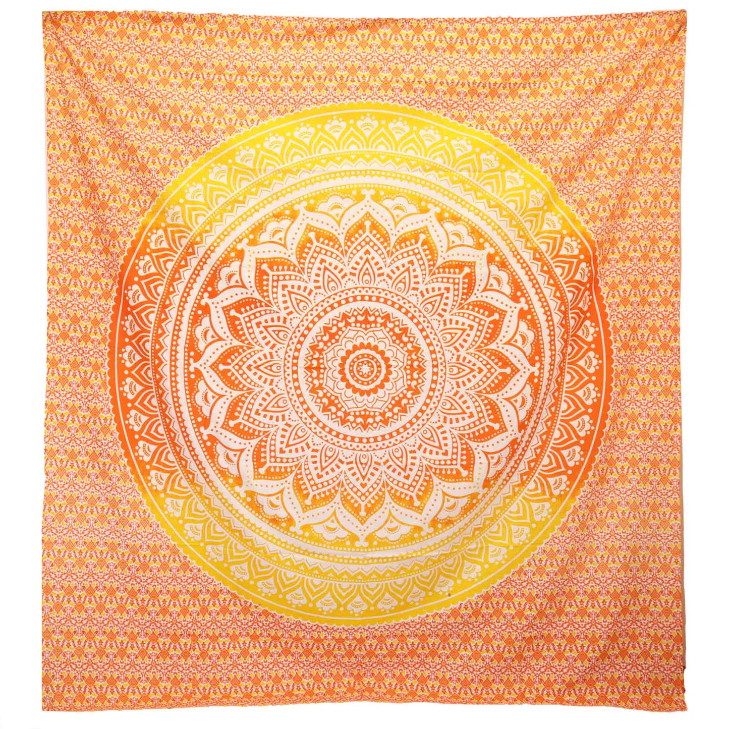 A vibrant, intricate mandala design covers a fabric tapestry, featuring orange and yellow hues with detailed patterns radiating from the center, set against a patterned background.