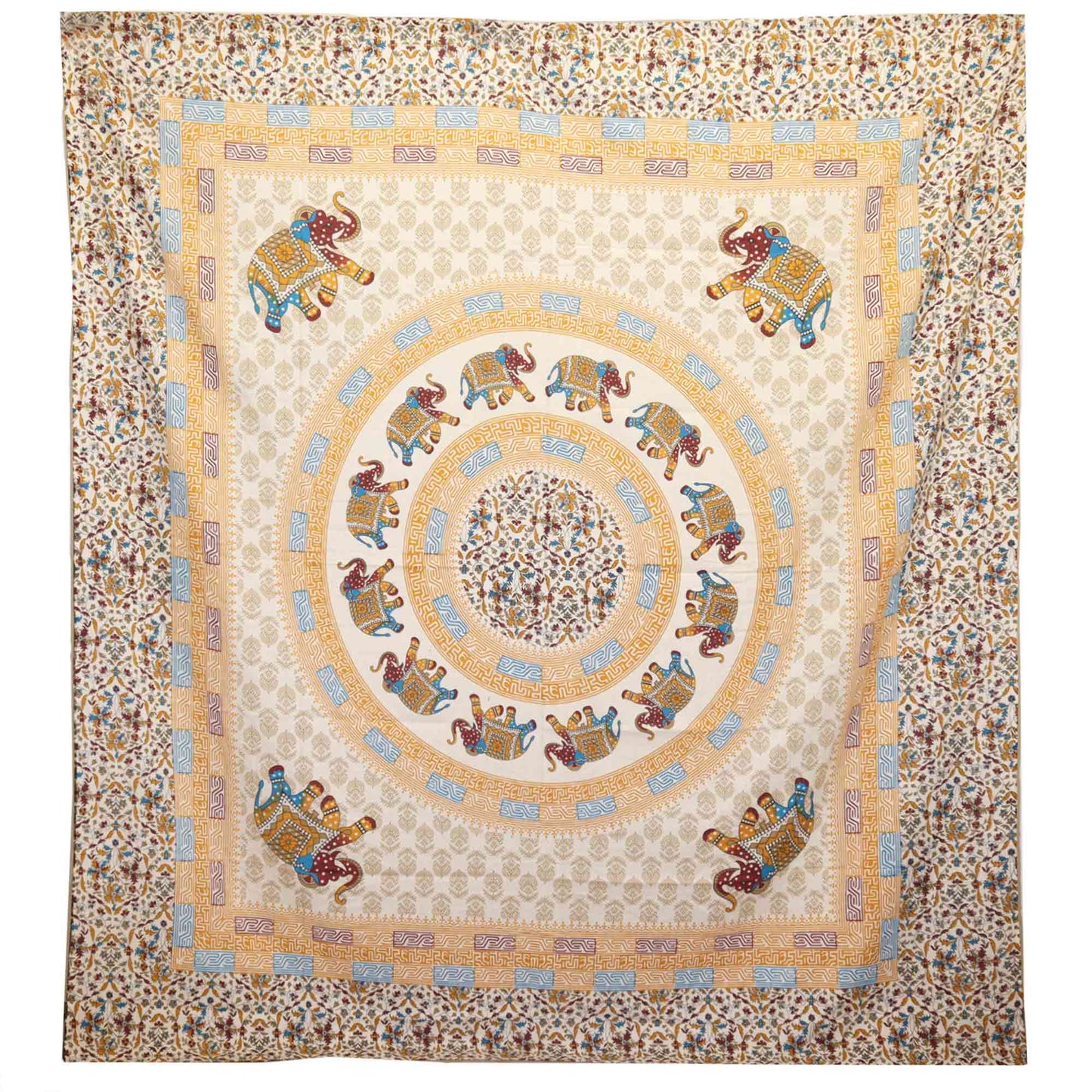 A large textile features concentric circles of colorful, patterned elephants. Surrounding these are intricate floral designs, creating an ornate, symmetrical motif on the fabric.