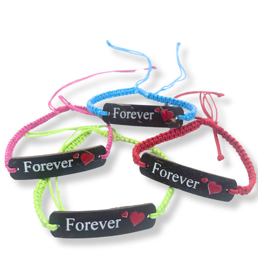 Four woven bracelets display black plaques with the word "Forever" and red hearts. They come in pink, blue, green, and red, set against a white background.