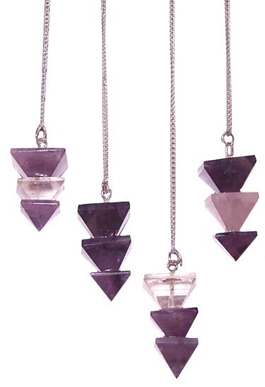 Four stacked triangular crystal pendulums hang from silver chains against a white backdrop. The pendulums alternate amethyst and clear quartz crystals.