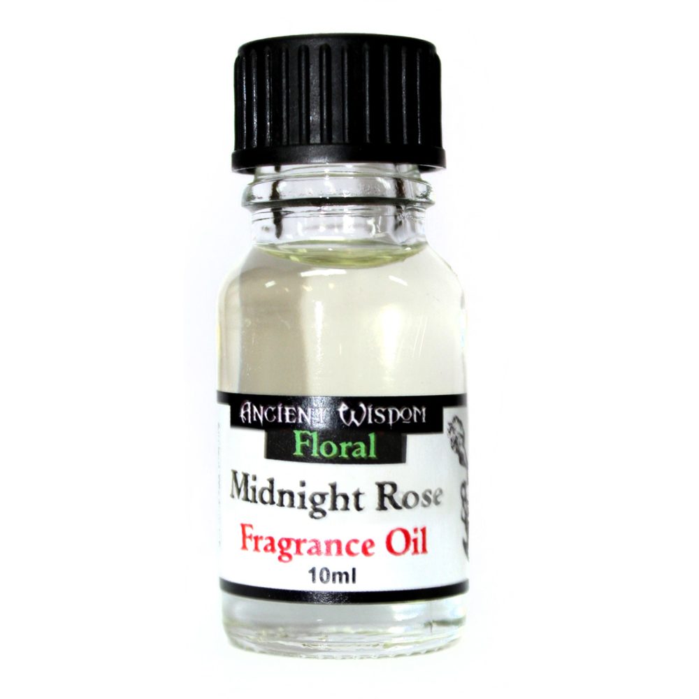 A small, clear glass bottle containing a light-colored liquid sits on a white background. The bottle is capped with black and features a label that reads: ANCIENT WISDOM Floral Midnight Rose Fragrance Oil 10ml.
