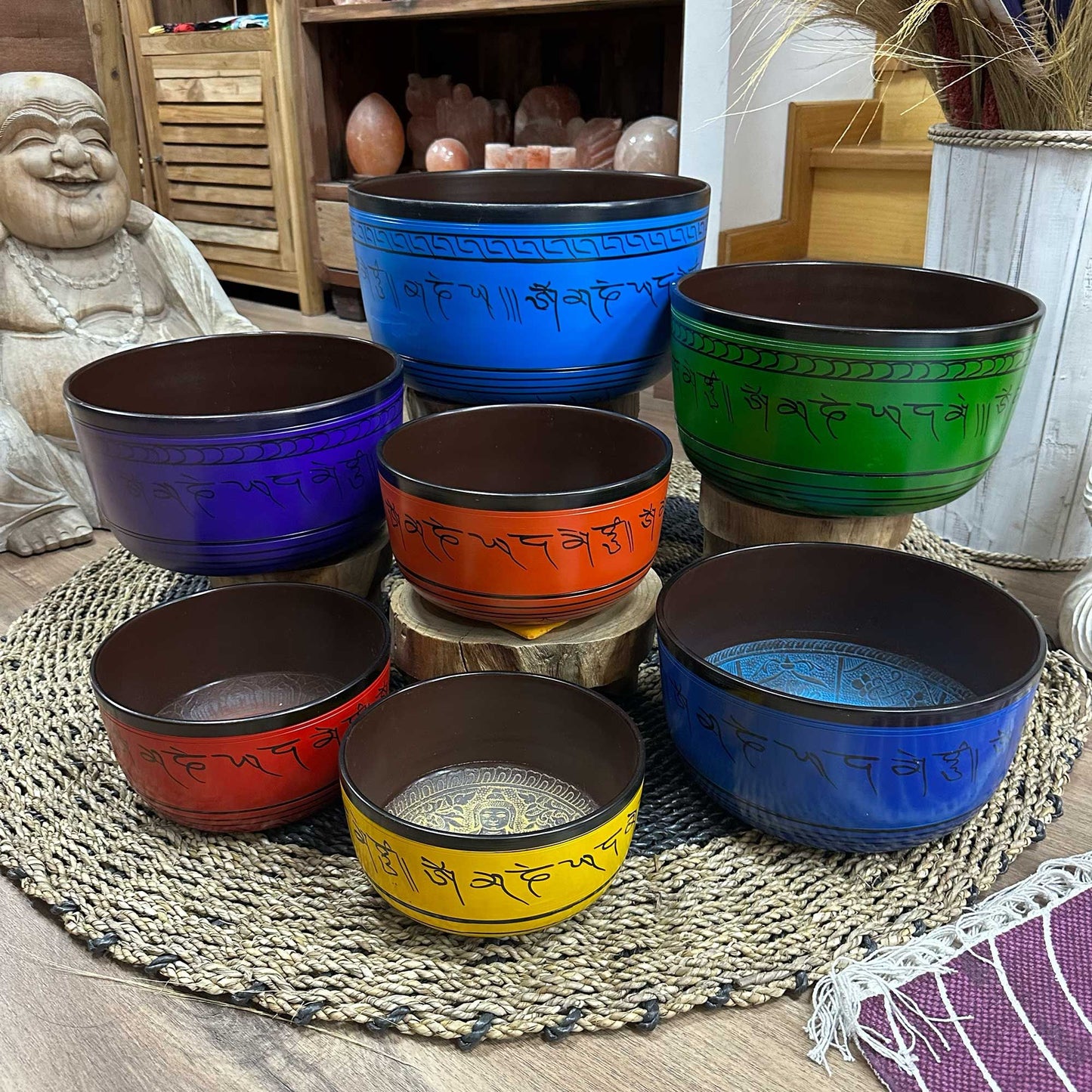 Large chakra singing bowl set – seven bell metal bowls in graded sizes, tuned for chakra alignment with matching cushions and accessories.